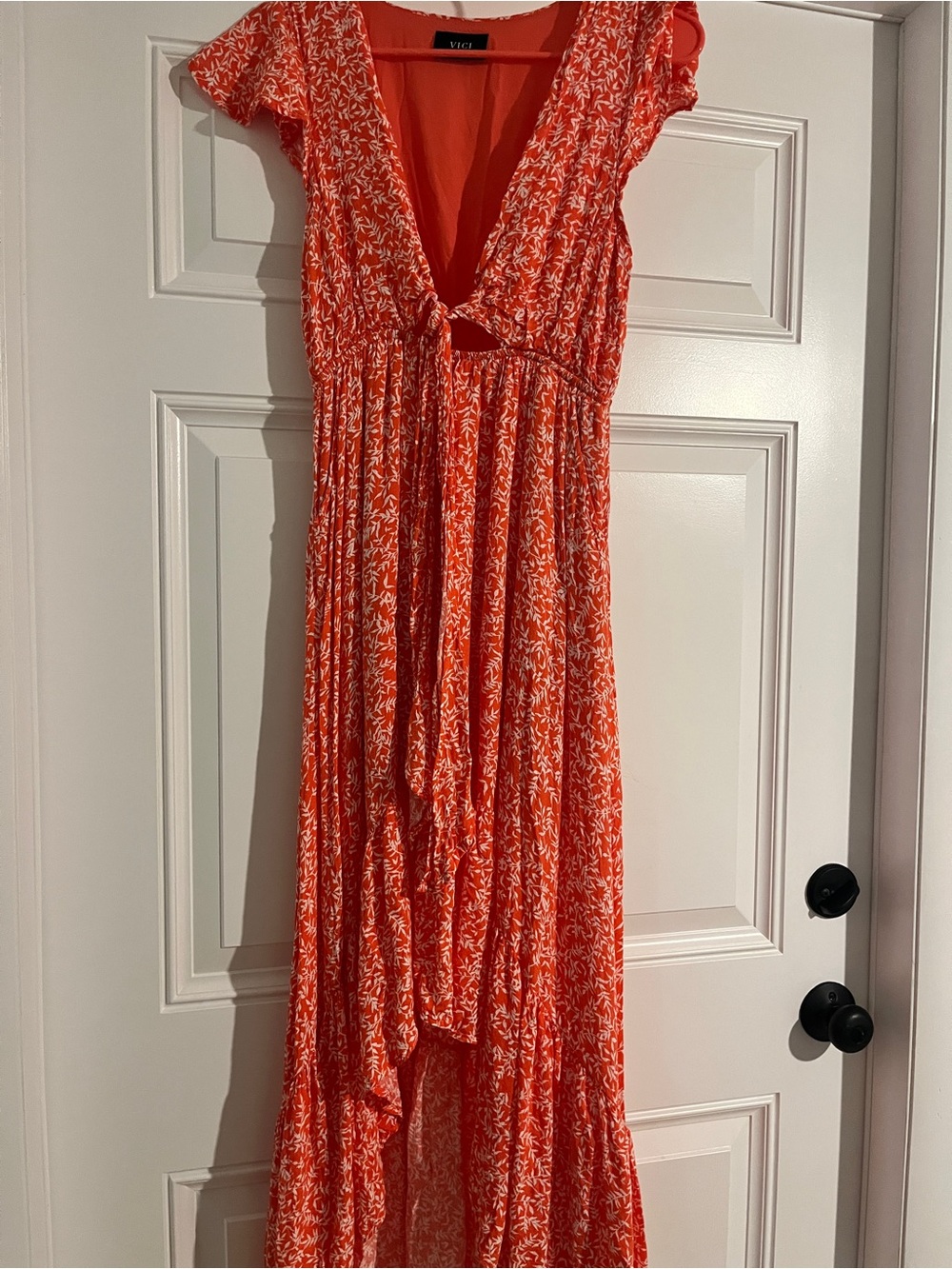VICI small Orange and White Floral Maxi Dress with Front Tie, cut out.